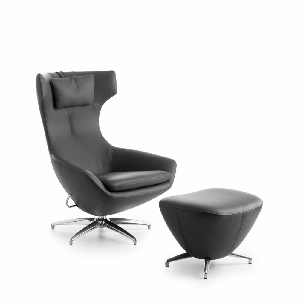 Leolux Drehsessel Caruzzo Leder schwarz mit Hocker Forte